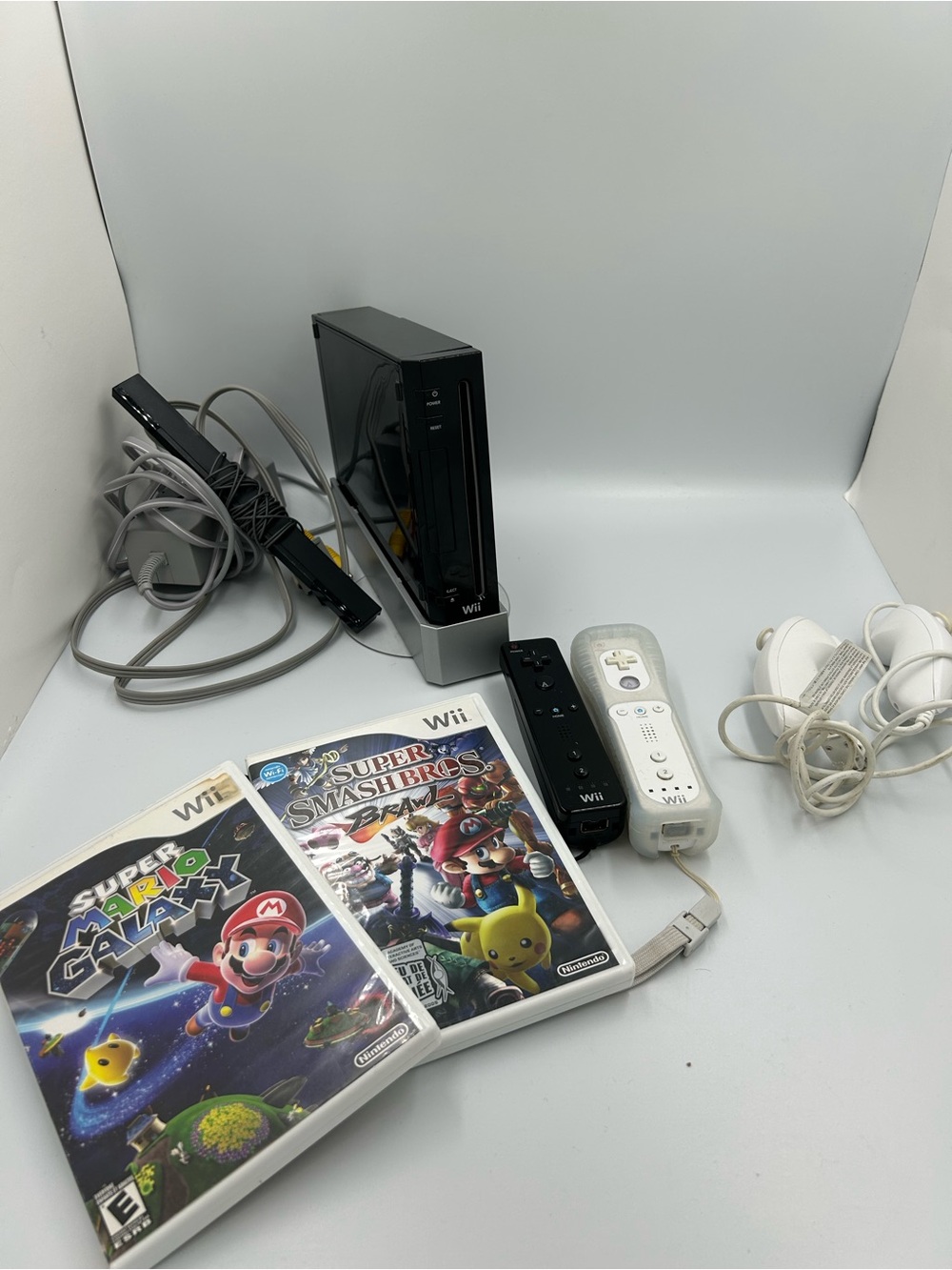 Nintendo RVL-101 Wii Console - (black) with controllers and games bundle